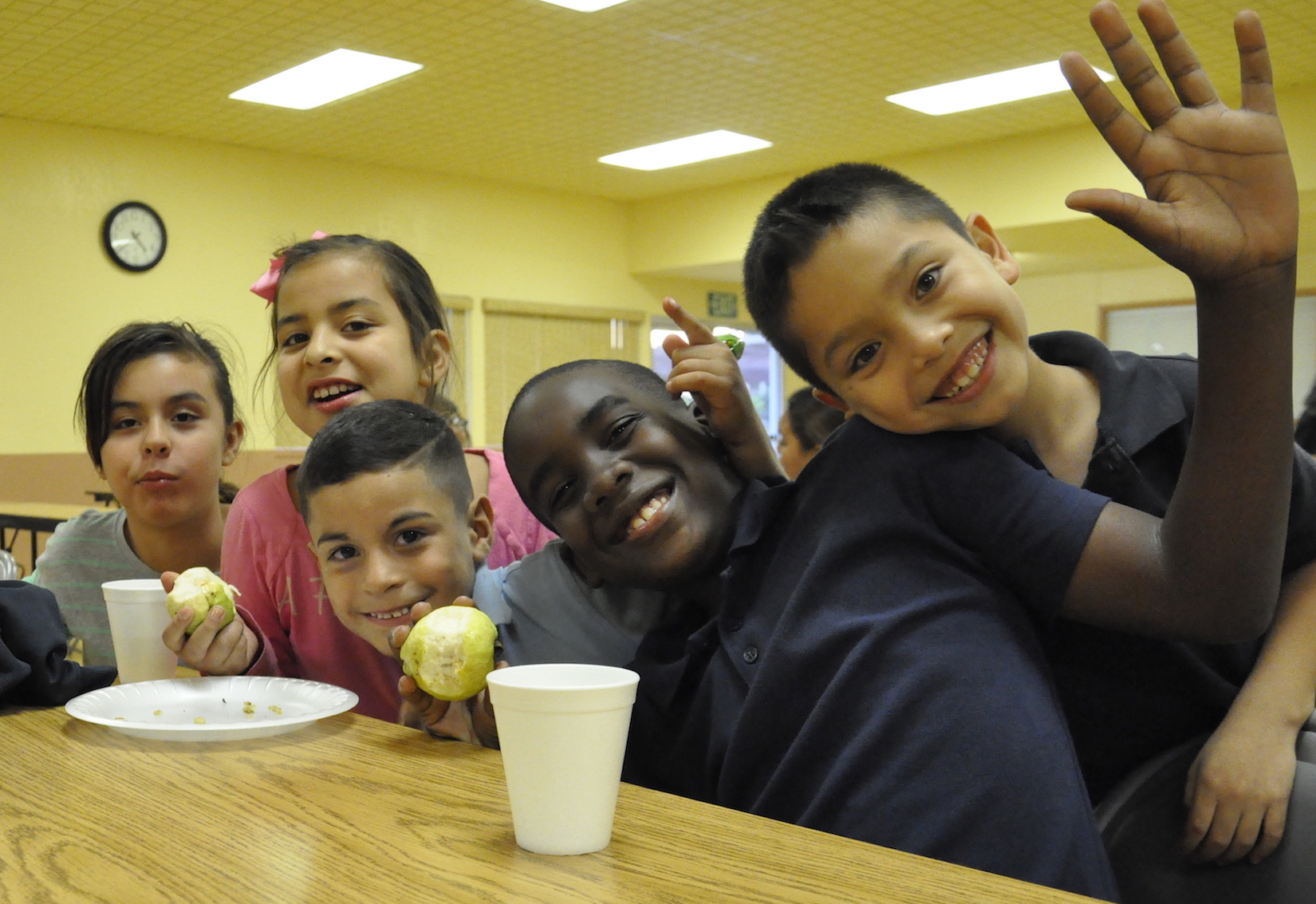 An empowered community sees measurable change including energetic children with full bellies after a “parent & me” healthy cooking demonstrations (menu: brown rice & lentil patties, guavas, and guava juice).